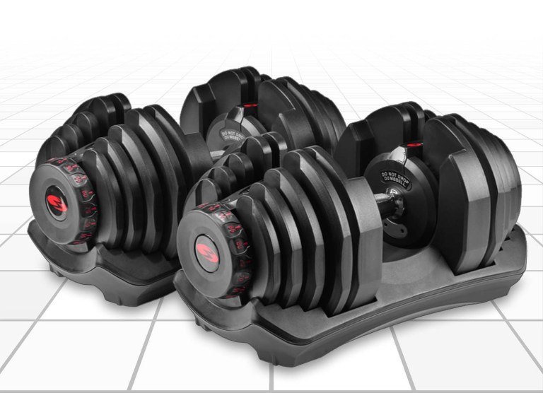 Image of the Bowflex SelectTech 1090 Adjustable Dumbbells on their high-strength plastic pedestals