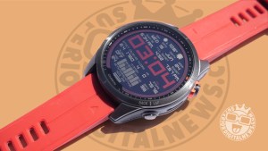 Image of the Garmin Fenix 7s Solar Edition with a red silicone strap and custom watchface
